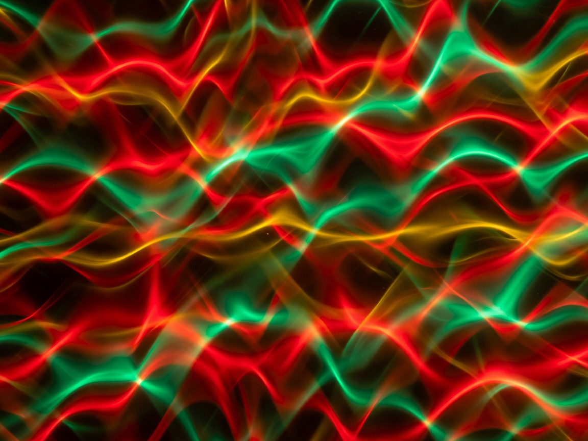 Abstract macro shot of intensely bright red and green light waves