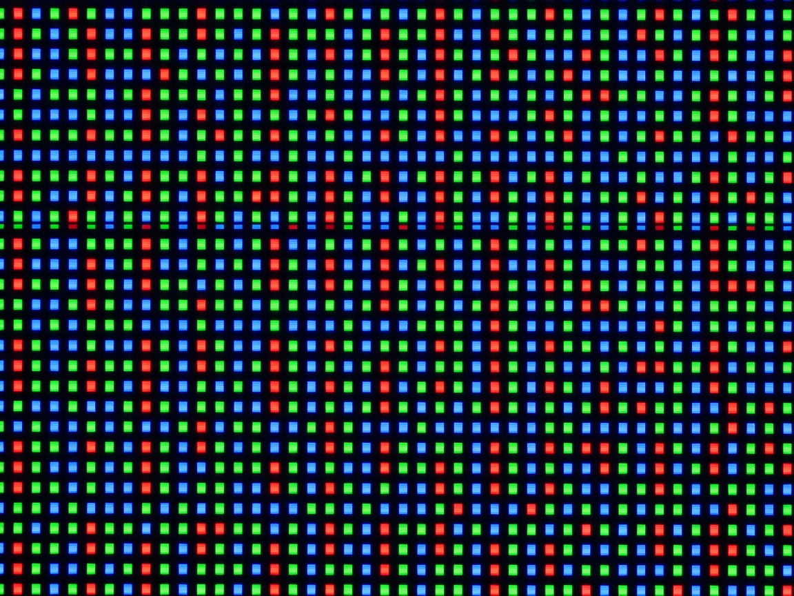 Extreme close up showing red, green, and blue subpixels on a screen